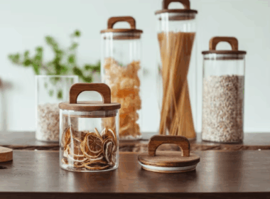 Transparent glass storage jars with sealed wooden lids