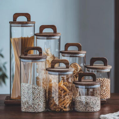 Transparent glass storage jars with sealed wooden lids