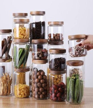 Transparent glass storage jar with acacia