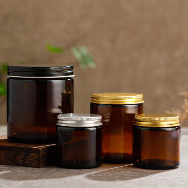 Round amber glass candle jars 