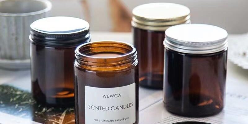Round amber glass candle jars