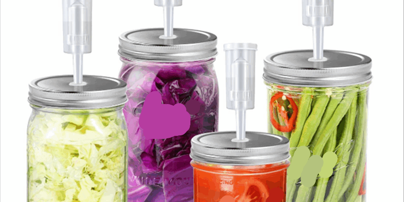 Wide-mouth Mason glass jars with airlocks